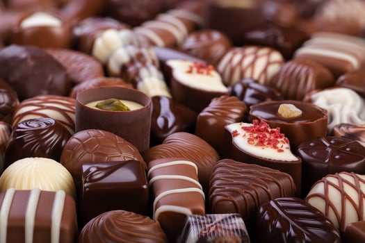 various candy and truffles, chocolate sweetness for dessert. sweet food background photo