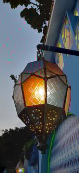 Beautiful Arabian Turkish hanging light. Lantern lamp night decoration exterior background photo