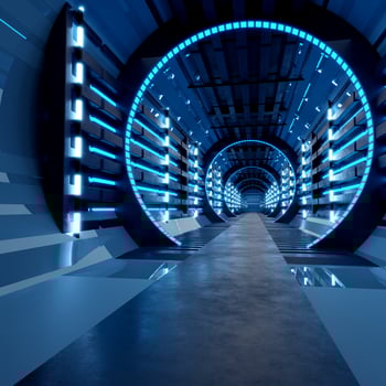 The neon blue airlock tunnel glows around the corridor on the reflective concrete floor. photo