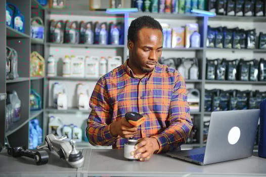 Smiling african Salesman Auto Parts Store photo