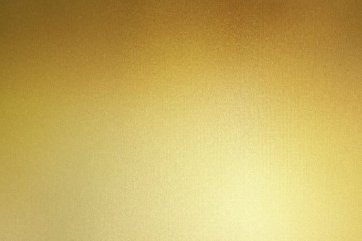 Radiant Gold Foil, Shimmering Metal Sheet Wall with Textured Surface. photo