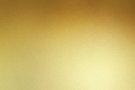 Radiant Gold Foil, Shimmering Metal Sheet Wall with Textured Surface. photo