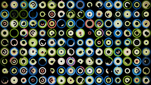 Plenty of small multicolored circles spinning on the black background in different sequence. Animation. Beautiful abstract background. photo