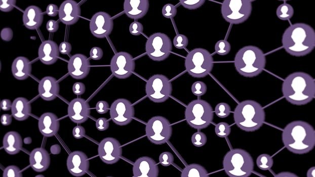 Social connection animation. Icons of people linked to a group on a black background photo