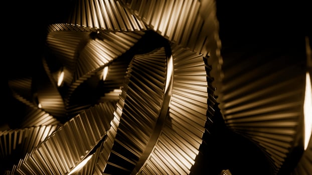 Abstract spinning bronze metal spiral, hypnotic effect. Design. Endless rotation of metal ribbons. photo