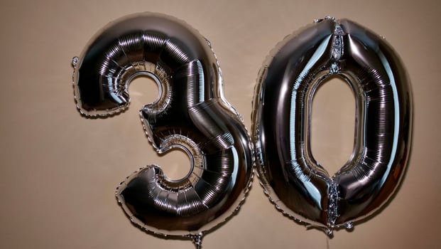 Party Happy Birthday Thirty with Silver Grey number . Gel balls 30 for congratulations celebrations holiday. Close-up, no people photo