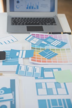 Close up ux developer and ui designer use augmented reality brainstorming about mobile app interface wireframe design on desk at modern office.Creative digital development agency photo