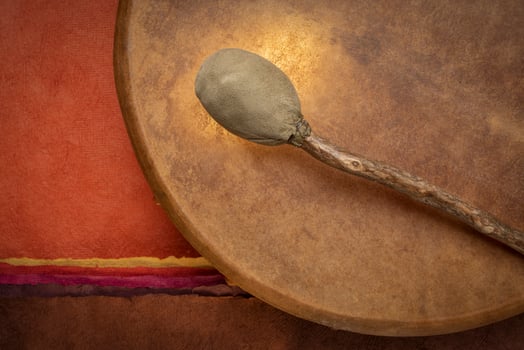 shaman frame drum with a beater photo