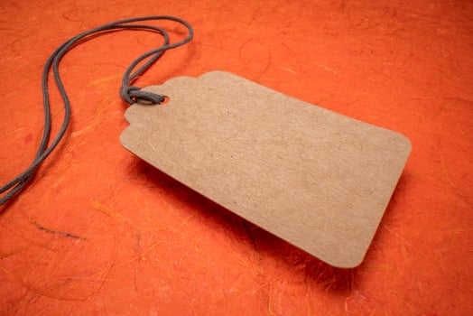 blank paper price tag with a twine photo