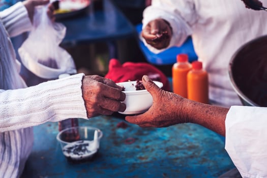 Food assistance to the homeless poor from volunteers concepts of public hunger. photo