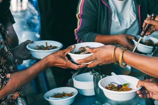 Food assistance to the homeless poor from volunteers concepts of public hunger. photo