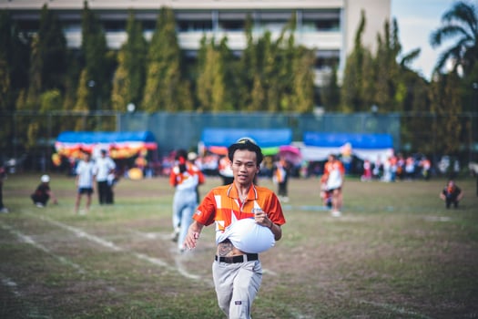 ChiangMai Thailand  November 30 2022  Asian teenage students are doing a sack race for unity in Chiang Mai Rajabhat University photo