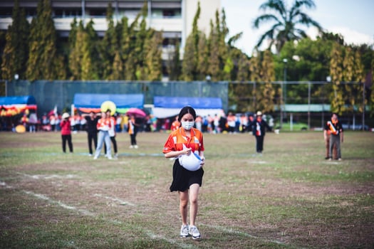 ChiangMai Thailand  November 30 2022  Asian teenage students are doing a sack race for unity in Chiang Mai Rajabhat University photo