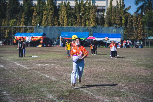 ChiangMai Thailand  November 30 2022  Asian teenage students are doing a sack race for unity in Chiang Mai Rajabhat University photo
