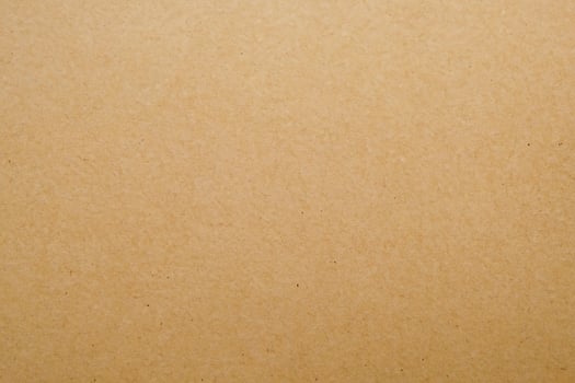 Close up Shot, Textured Surface of Brown Paper Box. photo