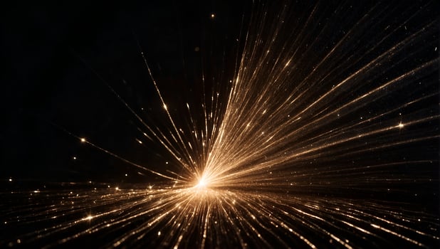 A burst of light, a magical glittering light, on a completely black background, for a screen overlay photo