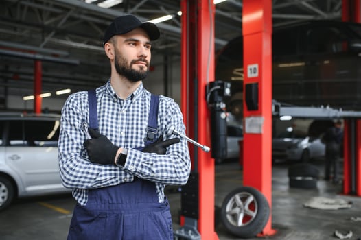 Male mechanic in car service center photo