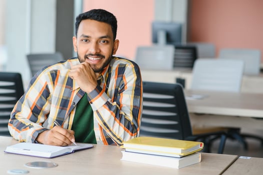 Handsome and young indian Male college student. photo