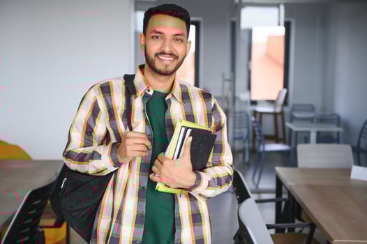 Handsome and young indian Male college student. photo