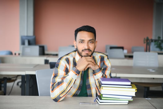 Handsome and young indian Male college student. photo