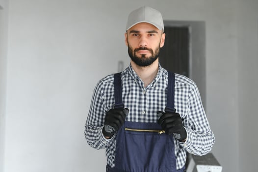 Positive male repairman at home photo