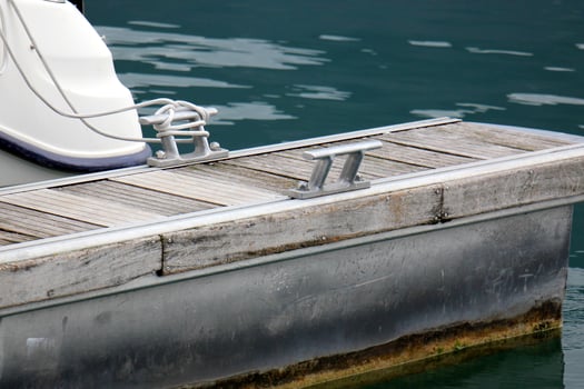 A pier on the shore for mooring boats and yachts. photo