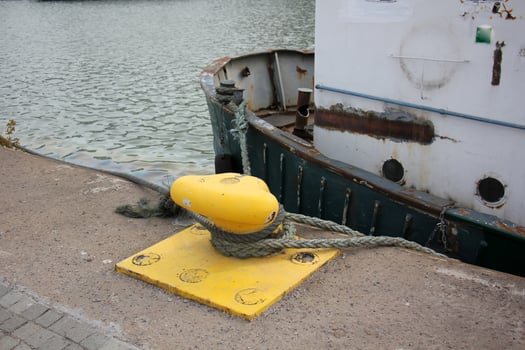 A pier on the shore for mooring boats and yachts. photo