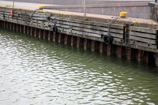 A pier on the shore for mooring boats and yachts. photo
