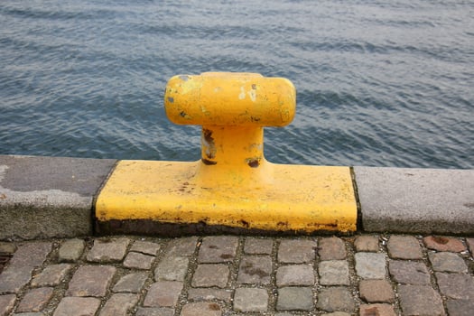 A pier on the shore for mooring boats and yachts. photo