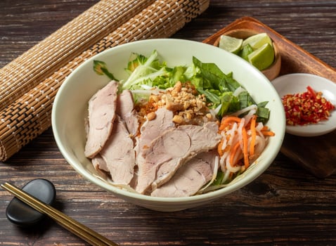 Dried Pork Hor Fun Fish Sauce served in bowl isolated on table top view of taiwan food photo