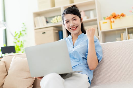 Photo of young Asian girl at home