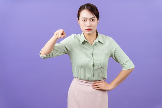 Photo of young Asian woman on purple background