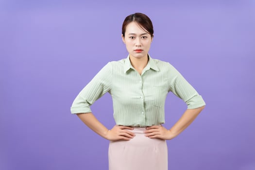 Photo of young Asian woman on purple background