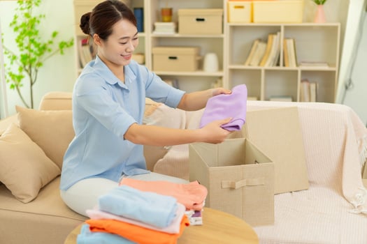 Photo of young Asian woman at home
