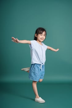 Photo of Asian baby girl on background