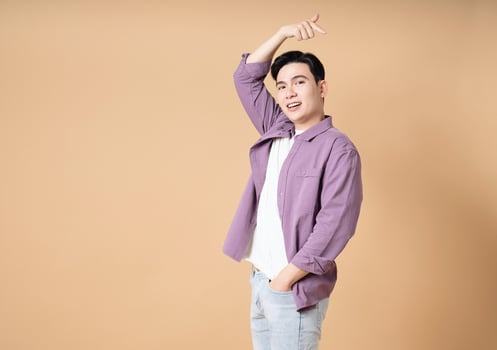 Photo of young Asian man on background