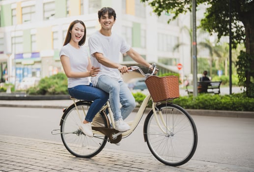 Photo of young Asian couple outdoor
