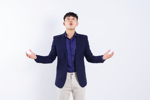 Photo of young Asian businessman on white background