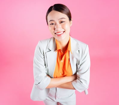 Photo of young Asian businesswoman on background