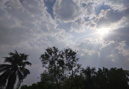 The light from the sun shining through the clouds. photo