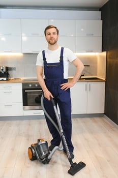 Dry cleaner's employee in flat photo
