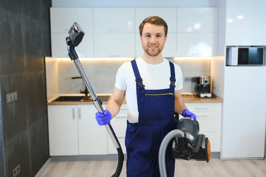 Dry cleaner's employee in flat photo
