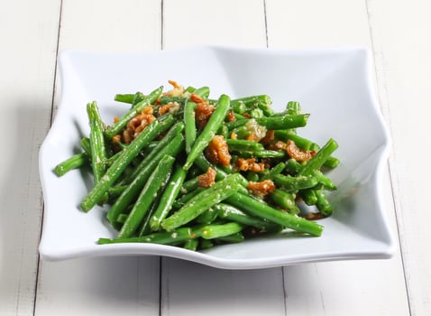 dried shrimp fried french beans served in dish isolated on table top view of singapore food photo