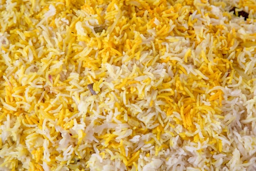 Biryani texture closeup background pulao rice top view of arabic food photo