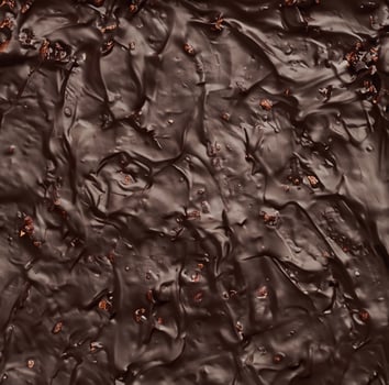 Indulgent Delight, Textured Baked Brownie Chocolate Cake with Rich Poured Chocolate. photo