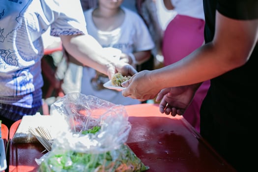 Feeding the poor to help each other in society. Charity concept photo