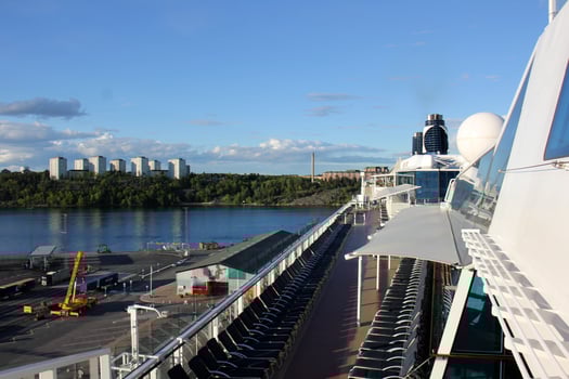 On the upper deck of a large ocean liner. photo