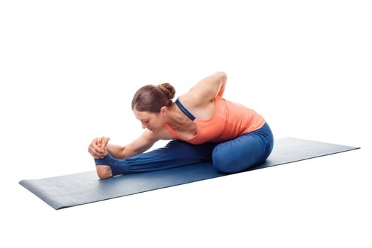 Woman doing Ashtanga Vinyasa Yoga asana photo