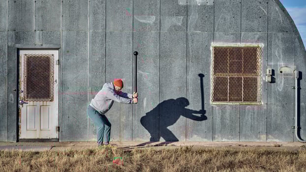 senior athletic male is exercising with a steel mace photo