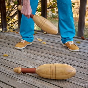 workout with wooden Indian exercise clubs photo